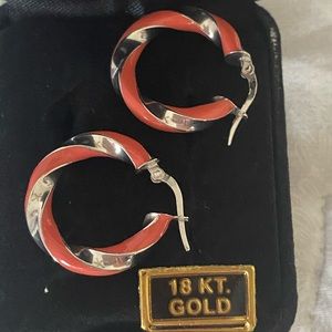 18k white gold earrings with coral enamel.